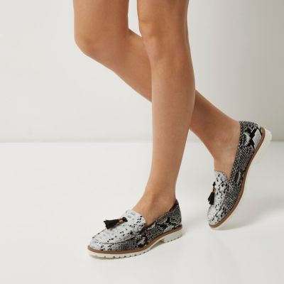 Black snake print cleated sole loafers